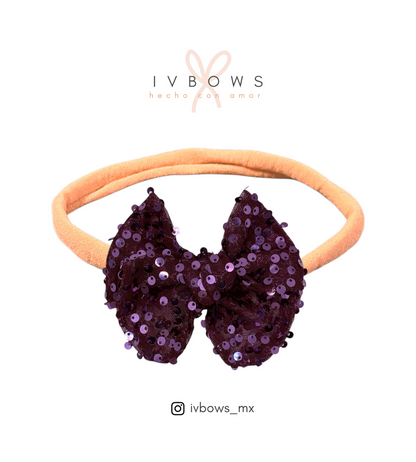 Moño clásico lentejuelas uva