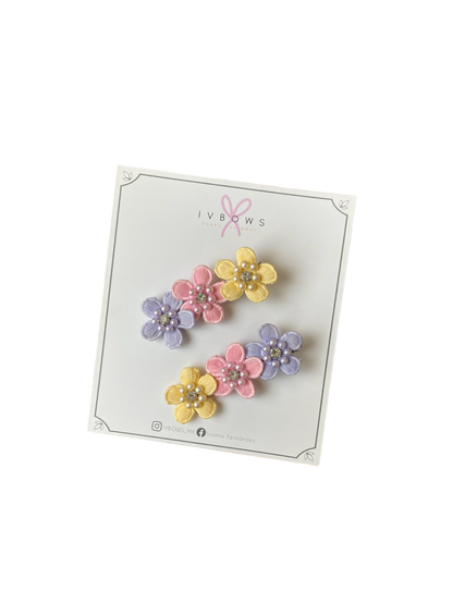 Broche de flores